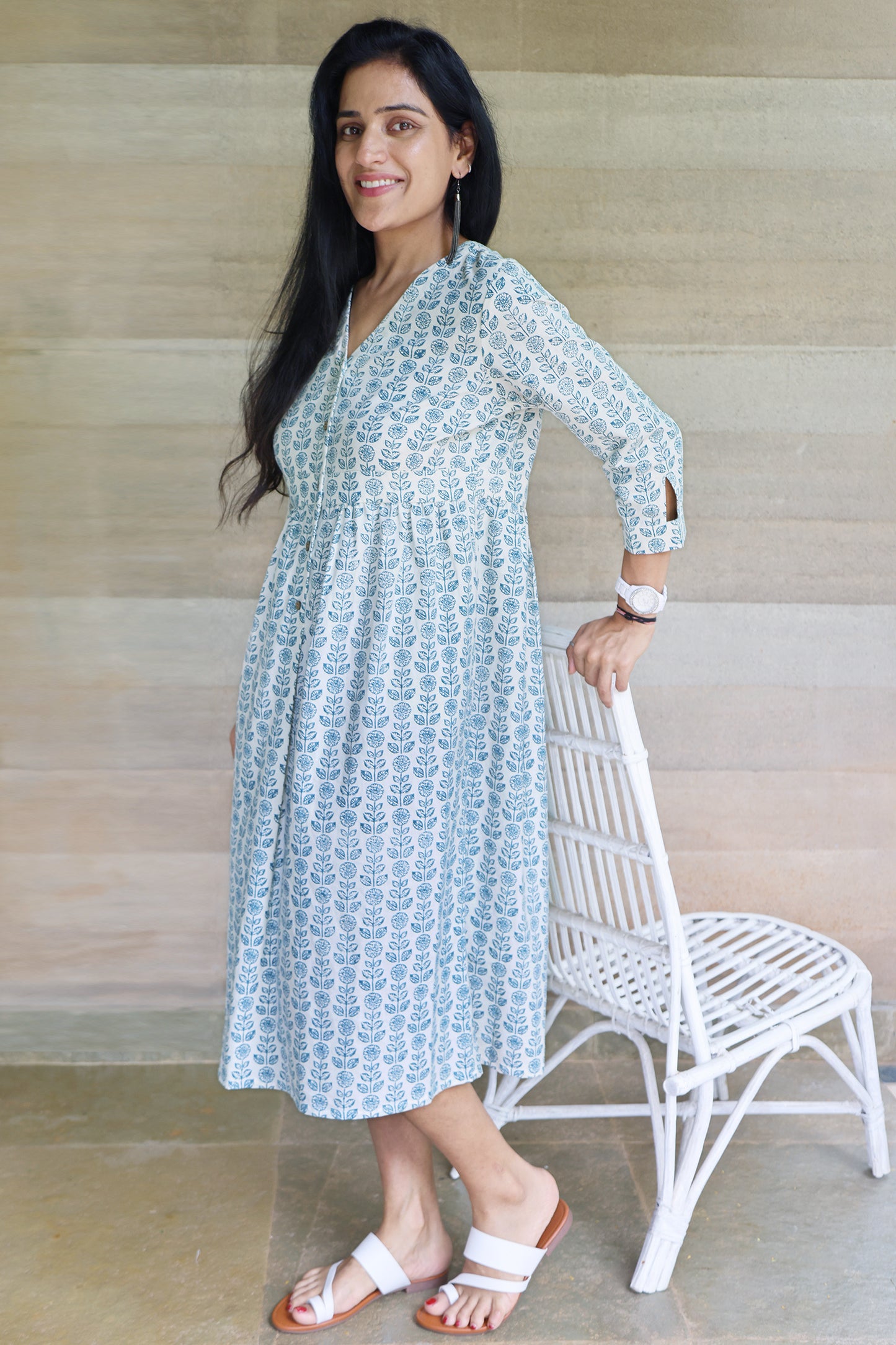 Off white and Teal Printed Midi Dress with a Triangle Cut on the Sleeve Cuff