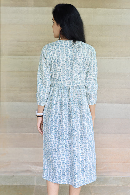 Off white and Teal Printed Midi Dress with a Triangle Cut on the Sleeve Cuff